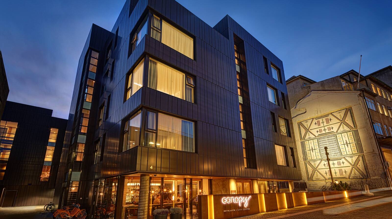 Canopy by Hilton Reykjavík City Centre illuminated at night
